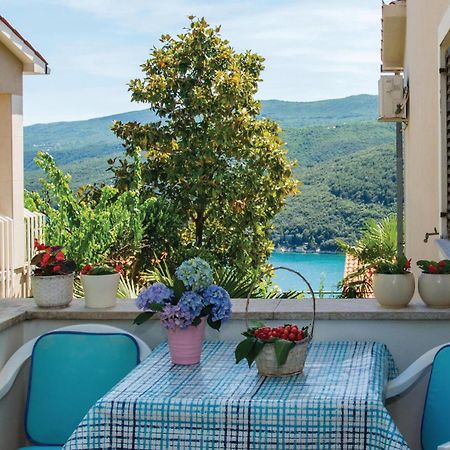 Beautiful Apartment In Rabac With Kitchen Exterior photo