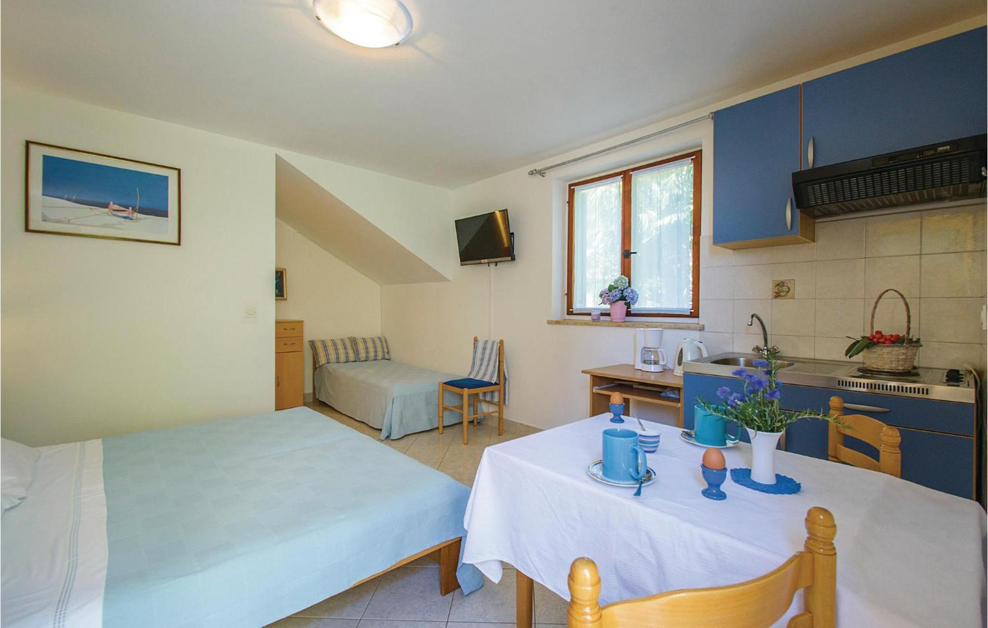 Beautiful Apartment In Rabac With Kitchen Exterior photo