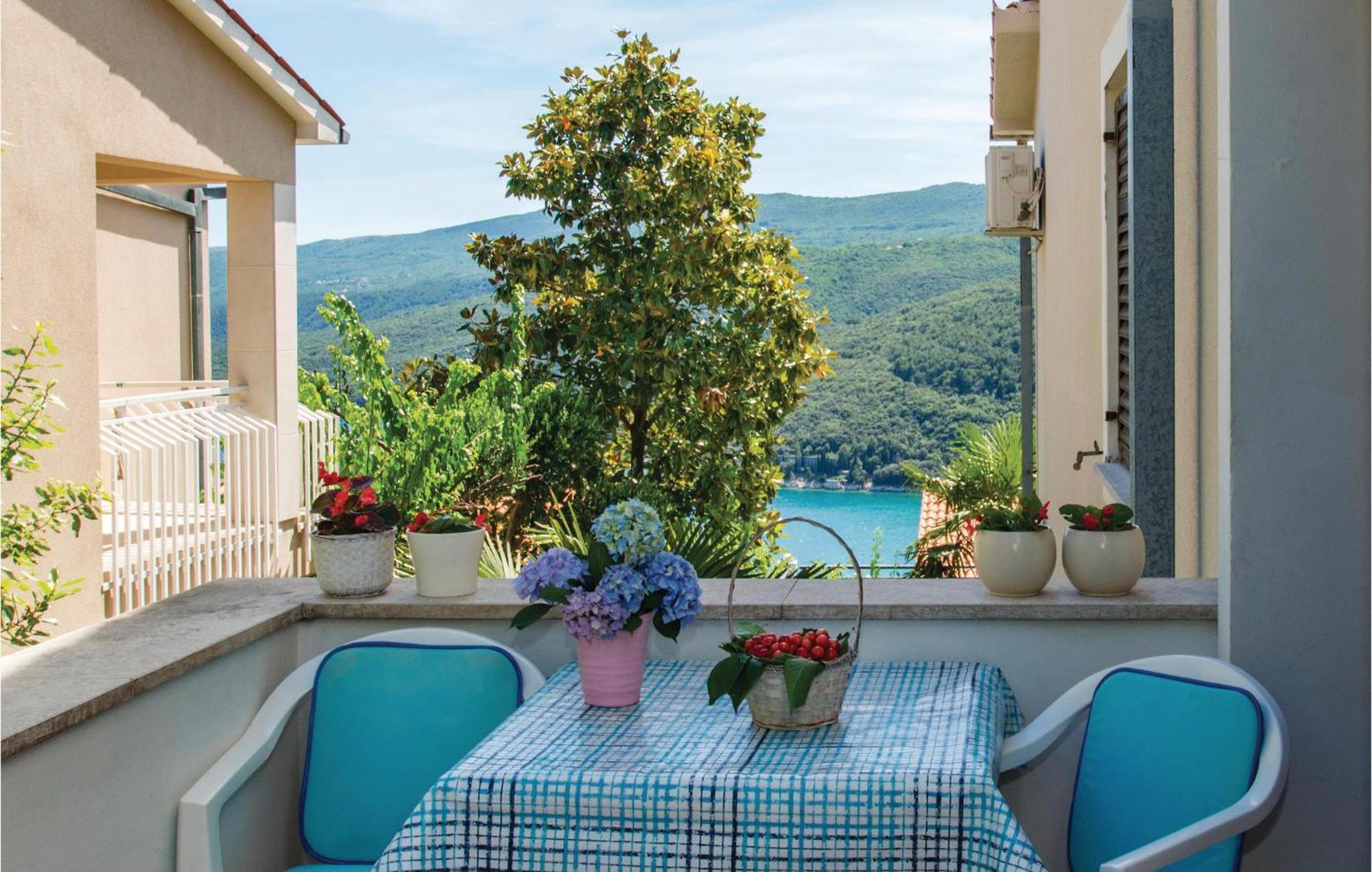 Beautiful Apartment In Rabac With Kitchen Exterior photo